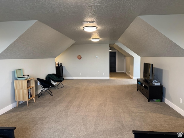 142 S 3500 W, Maeser, UT 84078 - sitting room with carpet, baseboards, vaulted ceiling, and a textured ceiling