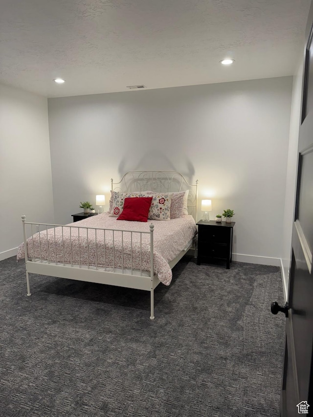 142 S 3500 W, Maeser, UT 84078 - bedroom featuring baseboards, visible vents, dark colored carpet, and recessed lighting