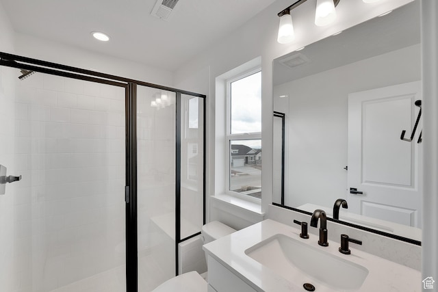 6161 W Teton Ranch Dr Unit 342, Herriman, UT 84096 - bathroom with vanity, a stall shower, toilet, and recessed lighting