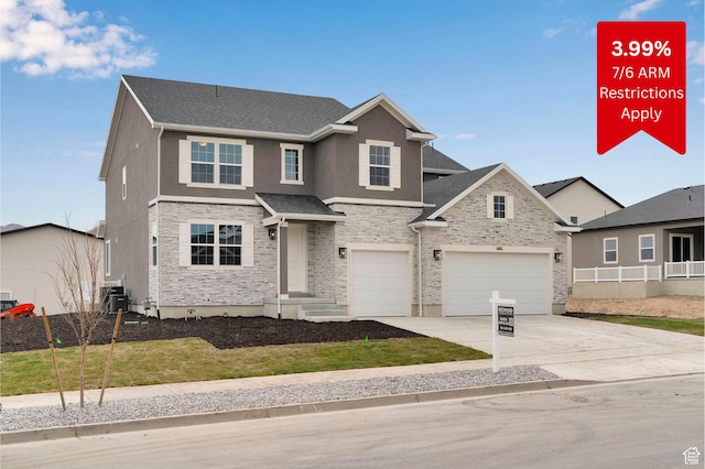 6161 W Teton Ranch Dr Unit 342, Herriman, UT 84096 - traditional home with stone siding, driveway, a garage, stucco siding, and central AC