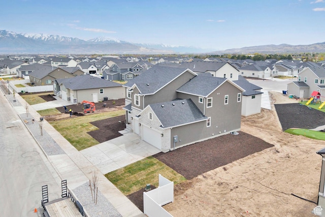 6161 W Teton Ranch Dr Unit 342, Herriman, UT 84096 - aerial perspective of suburban area featuring a mountainous background