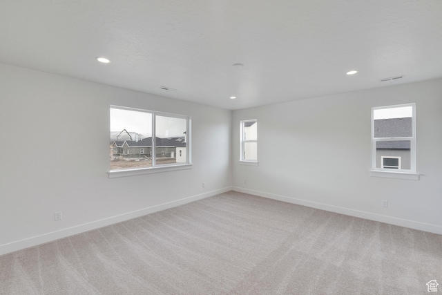 6161 W Teton Ranch Dr Unit 342, Herriman, UT 84096 - empty room with light colored carpet, baseboards, and recessed lighting
