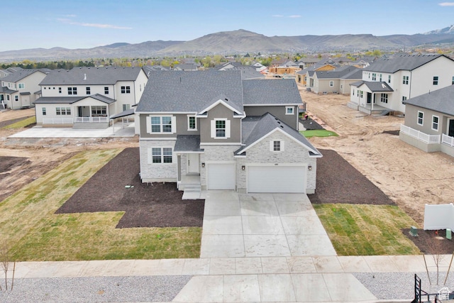 6161 W Teton Ranch Dr Unit 342, Herriman, UT 84096 - traditional-style house with a residential view, roof with shingles, an attached garage, stone siding, and driveway