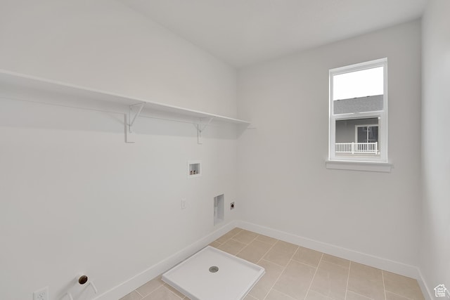 6161 W Teton Ranch Dr Unit 342, Herriman, UT 84096 - washroom with hookup for a washing machine, baseboards, and light tile patterned floors