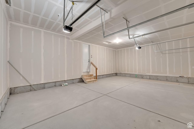 6161 W Teton Ranch Dr Unit 342, Herriman, UT 84096 - garage featuring a garage door opener