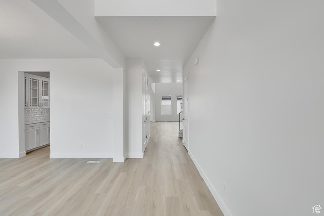 6161 W Teton Ranch Dr Unit 342, Herriman, UT 84096 - hallway with light wood-type flooring, recessed lighting, and baseboards