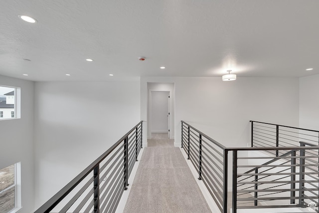 6161 W Teton Ranch Dr Unit 342, Herriman, UT 84096 - corridor with recessed lighting, light colored carpet, baseboards, and an upstairs landing