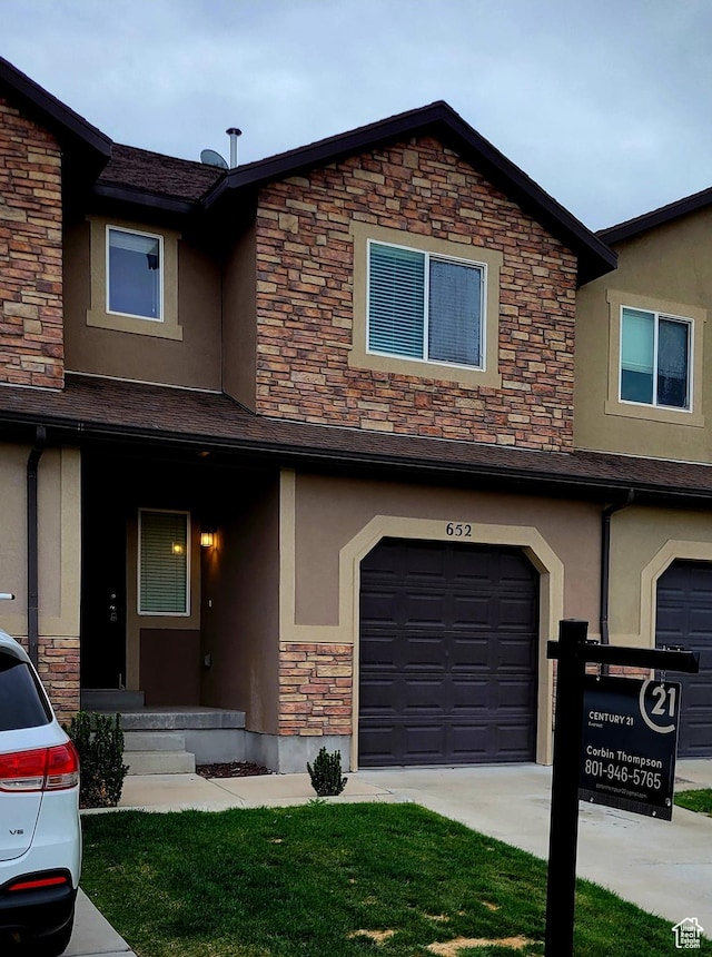 652 W Pimlico Dr, Saratoga Springs, UT 84045 - multi unit property with an attached garage, stucco siding, stone siding, and concrete driveway