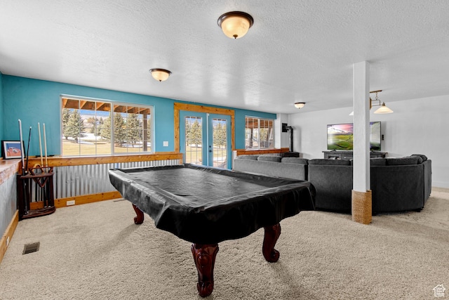 2599 S Foxridge Rd, Garden City, UT 84028 - playroom with carpet floors, french doors, a textured ceiling, billiards, and visible vents