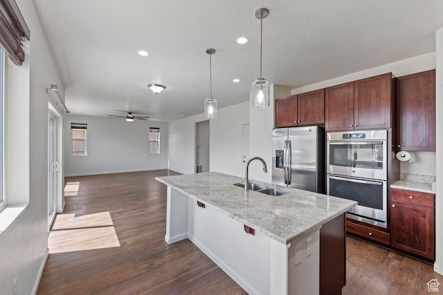 49 W Paper Bark St, Vineyard, UT 84059 - kitchen with a ceiling fan, a sink, baseboards, stainless steel appliances, and recessed lighting