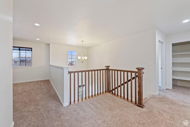 49 W Paper Bark St, Vineyard, UT 84059 - hall featuring carpet floors, recessed lighting, a notable chandelier, and an upstairs landing