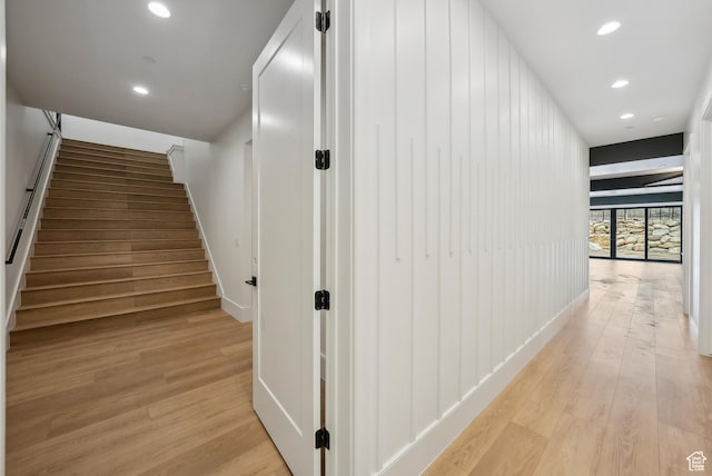 13042 N Prospector Way, Alpine, UT 84004 - hall with light wood-style flooring, stairs, recessed lighting, and baseboards