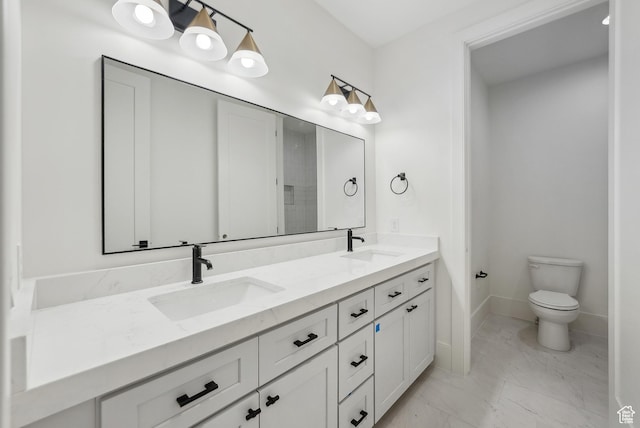 13042 N Prospector Way, Alpine, UT 84004 - bathroom featuring double vanity, marble finish flooring, toilet, and baseboards
