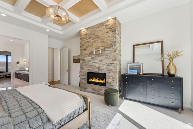 13042 N Prospector Way, Alpine, UT 84004 - carpeted bedroom with a stone fireplace, beam ceiling, a towering ceiling, connected bathroom, and coffered ceiling