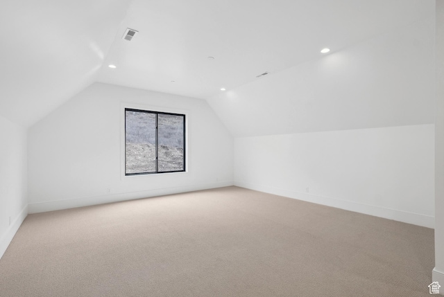 13042 N Prospector Way, Alpine, UT 84004 - additional living space with lofted ceiling, recessed lighting, light carpet, and baseboards