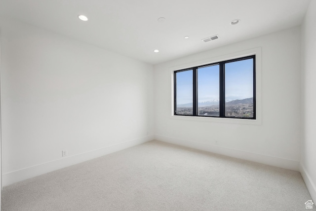 13042 N Prospector Way, Alpine, UT 84004 - spare room with light carpet, recessed lighting, and baseboards