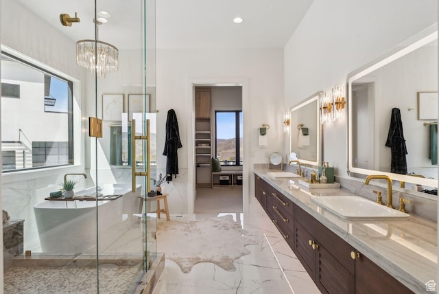 13042 N Prospector Way, Alpine, UT 84004 - full bathroom with marble finish floors, double vanity, a marble finish shower, recessed lighting, and a chandelier