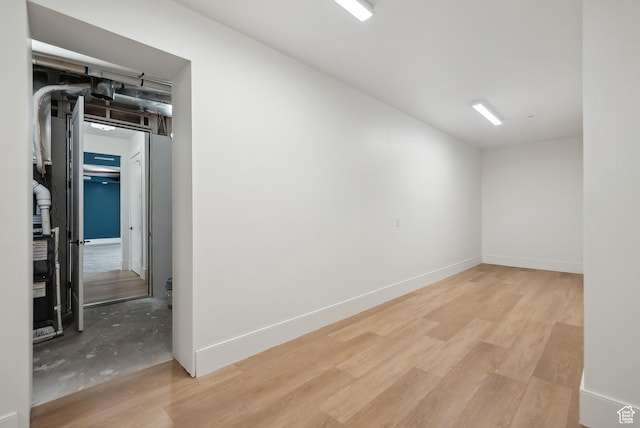 13042 N Prospector Way, Alpine, UT 84004 - empty room featuring light wood-style floors and baseboards