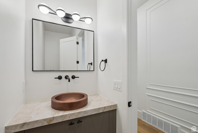 13042 N Prospector Way, Alpine, UT 84004 - bathroom featuring vanity and radiator heating unit