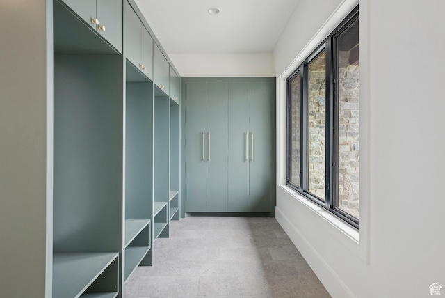 13042 N Prospector Way, Alpine, UT 84004 - mudroom with baseboards and concrete flooring
