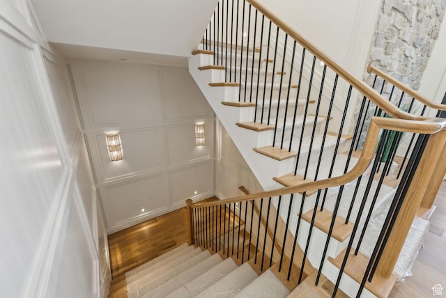 13042 N Prospector Way, Alpine, UT 84004 - stairway featuring a decorative wall and wood finished floors