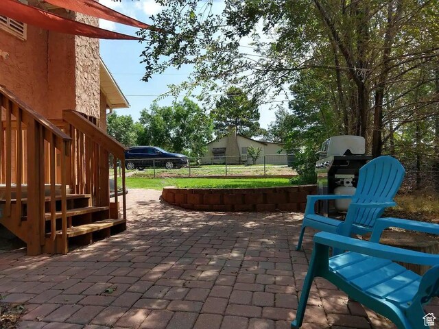 8 S 400 W, Blanding, UT 84511 - view of patio / terrace featuring fence