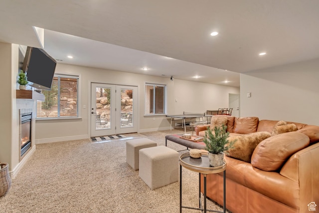 12483 N Timberline Dr, Highland, UT 84003 - carpeted living room featuring baseboards, recessed lighting, and a glass covered fireplace