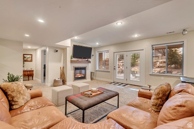 12483 N Timberline Dr, Highland, UT 84003 - living area with light colored carpet, visible vents, a fireplace, and recessed lighting