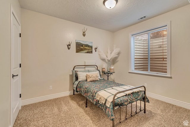 12483 N Timberline Dr, Highland, UT 84003 - carpeted bedroom with a textured ceiling, baseboards, and visible vents