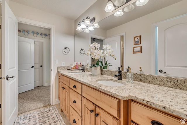 12483 N Timberline Dr, Highland, UT 84003 - full bath featuring double vanity, baseboards, a sink, and tile patterned flooring