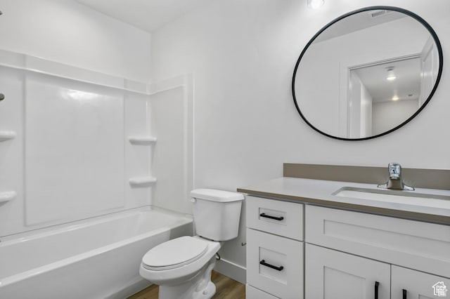 241 W 1160 N Unit 17, Tooele, UT 84074 - full bathroom with toilet, vanity, shower / bathtub combination, and wood finished floors