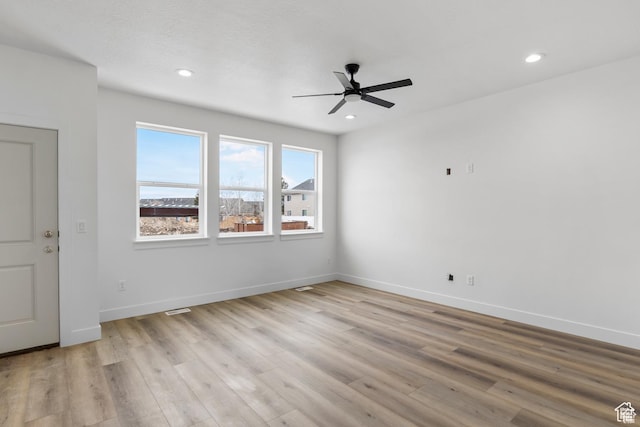241 W 1160 N Unit 17, Tooele, UT 84074 - spare room featuring light wood finished floors, baseboards, recessed lighting, and a ceiling fan