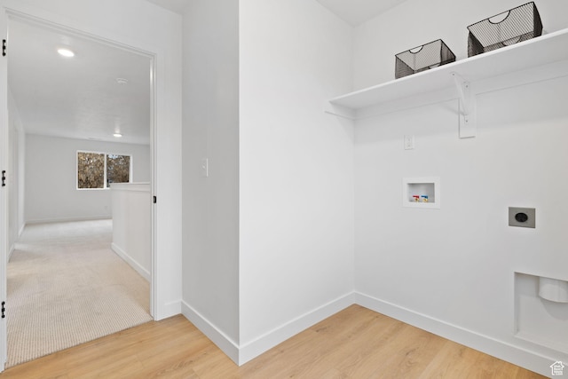 695 N Plainsman Dr Unit 110, Spanish Fork, UT 84660 - laundry room featuring laundry area, wood finished floors, hookup for an electric dryer, washer hookup, and baseboards