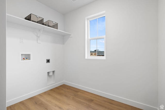 695 N Plainsman Dr Unit 110, Spanish Fork, UT 84660 - laundry area featuring baseboards, washer hookup, laundry area, light wood finished floors, and hookup for an electric dryer