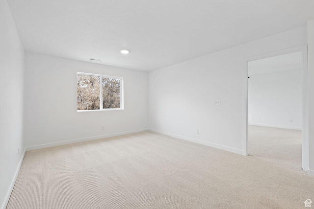695 N Plainsman Dr Unit 110, Spanish Fork, UT 84660 - empty room featuring light carpet, visible vents, and baseboards