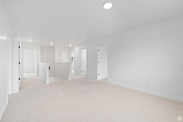 695 N Plainsman Dr Unit 110, Spanish Fork, UT 84660 - unfurnished room featuring light carpet and baseboards