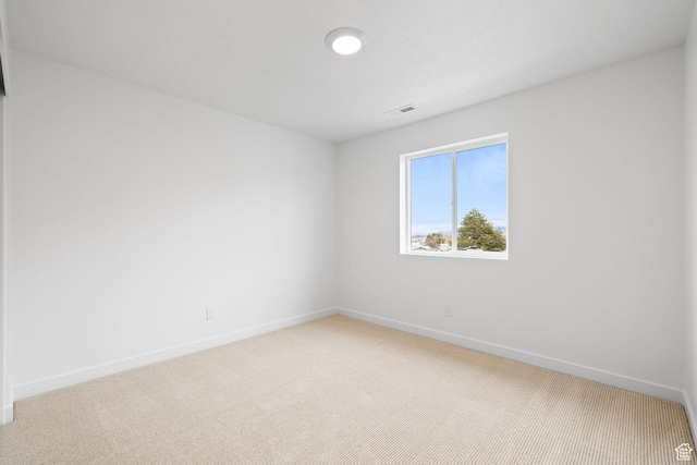 695 N Plainsman Dr Unit 110, Spanish Fork, UT 84660 - spare room with light carpet, baseboards, and visible vents