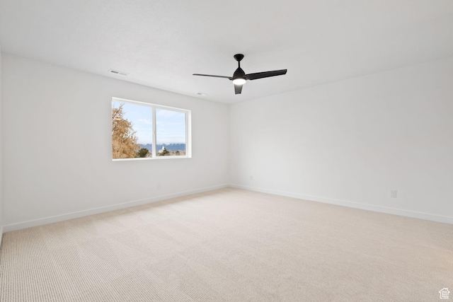 695 N Plainsman Dr Unit 110, Spanish Fork, UT 84660 - unfurnished room featuring light carpet, visible vents, baseboards, and a ceiling fan