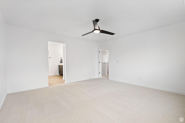 695 N Plainsman Dr Unit 110, Spanish Fork, UT 84660 - unfurnished bedroom with ensuite bathroom, baseboards, a ceiling fan, and light colored carpet