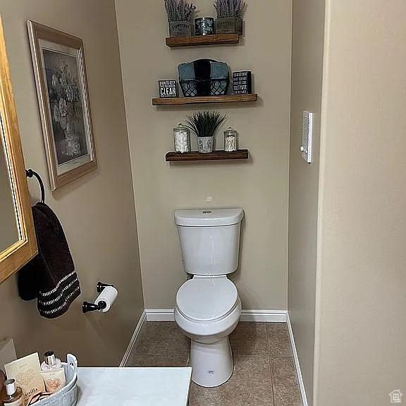 1345 W 1625 S, Price, UT 84501 - bathroom featuring toilet and baseboards