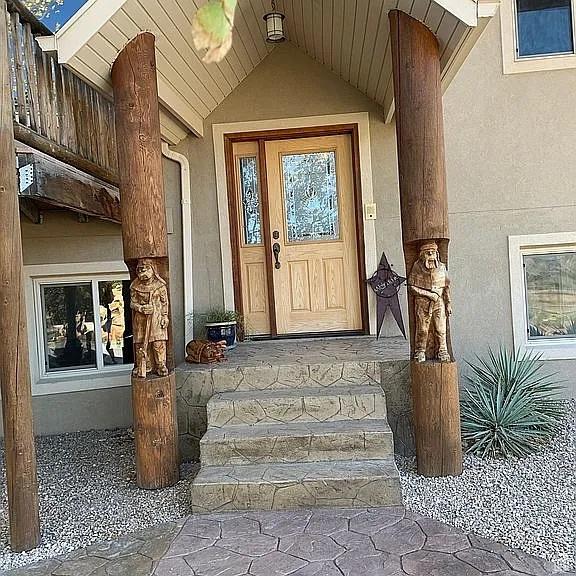 1345 W 1625 S, Price, UT 84501 - doorway to property featuring stucco siding
