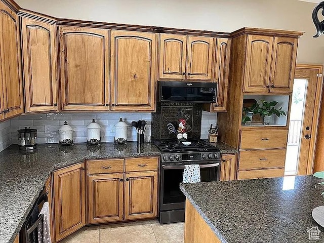 1345 W 1625 S, Price, UT 84501 - kitchen with gas range, dark stone countertops, and tasteful backsplash