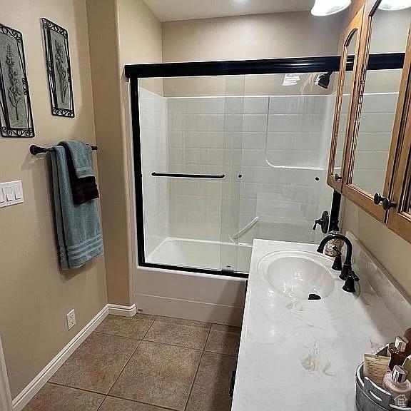 1345 W 1625 S, Price, UT 84501 - full bath with vanity, tile patterned floors, baseboards, and shower / bath combination with glass door