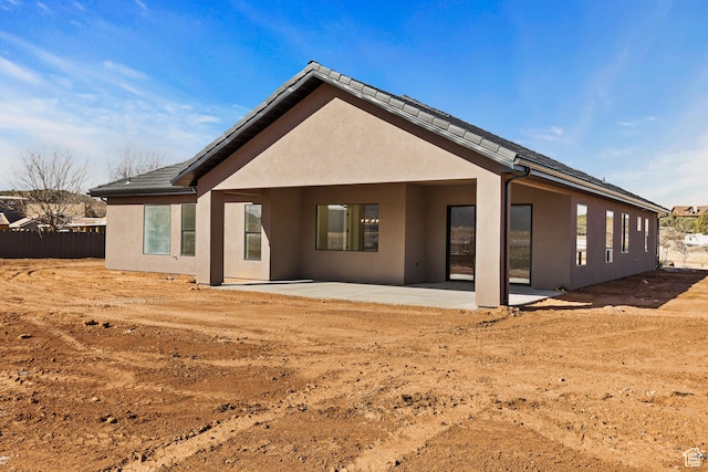 1522 N Zion Cir, Apple Valley, UT 84737 - back of property with fence, stucco siding, and a patio