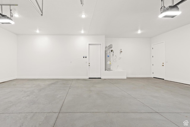 1522 N Zion Cir, Apple Valley, UT 84737 - garage with water heater, baseboards, and a garage door opener