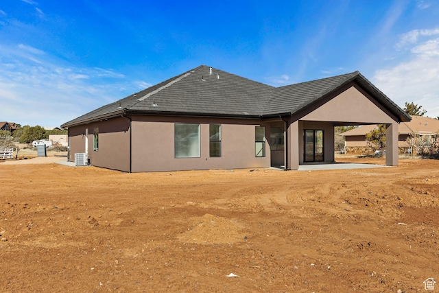 1522 N Zion Cir, Apple Valley, UT 84737 - back of house with central AC unit and stucco siding