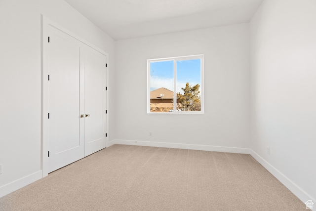 1522 N Zion Cir, Apple Valley, UT 84737 - unfurnished bedroom with baseboards and light colored carpet