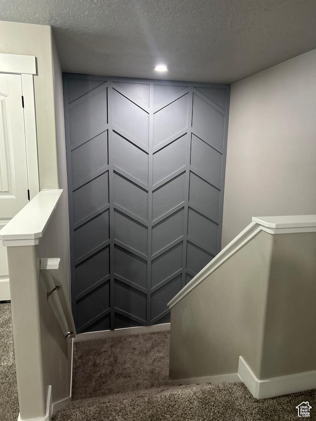 13907 S Birch Leaf W, Herriman, UT 84096 - stairway with a decorative wall, carpet, and a textured ceiling