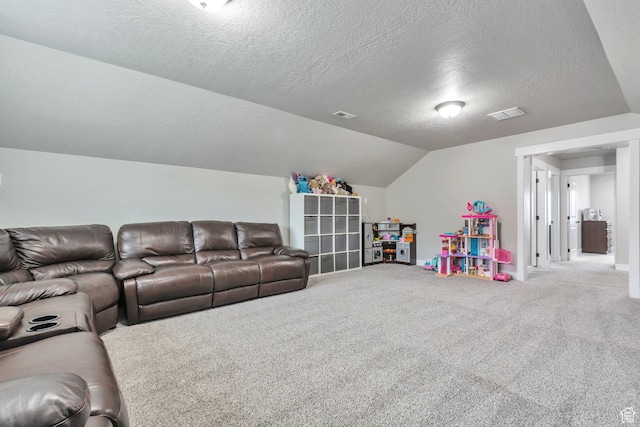 13907 S Birch Leaf W, Herriman, UT 84096 - home theater room featuring a textured ceiling, visible vents, vaulted ceiling, and carpet