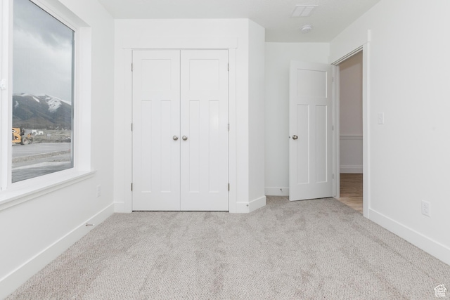 3291 S 1000 W, Nibley, UT 84321 - unfurnished bedroom with carpet, a closet, and baseboards